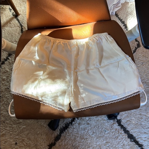 DONNI. Silk Tap Shorts in Light Yellow - Picture 5 of 17